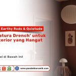 Ruangan interior dengan nuansa hangat berwarna earthy red, dilengkapi furnitur minimalis dan jendela besar, serta teks promosi cat tembok warna Natura Drench dari Pondok Keramik.